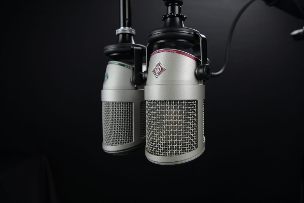 An image of two microphones as used by a voiceover artist when recording media services for clients